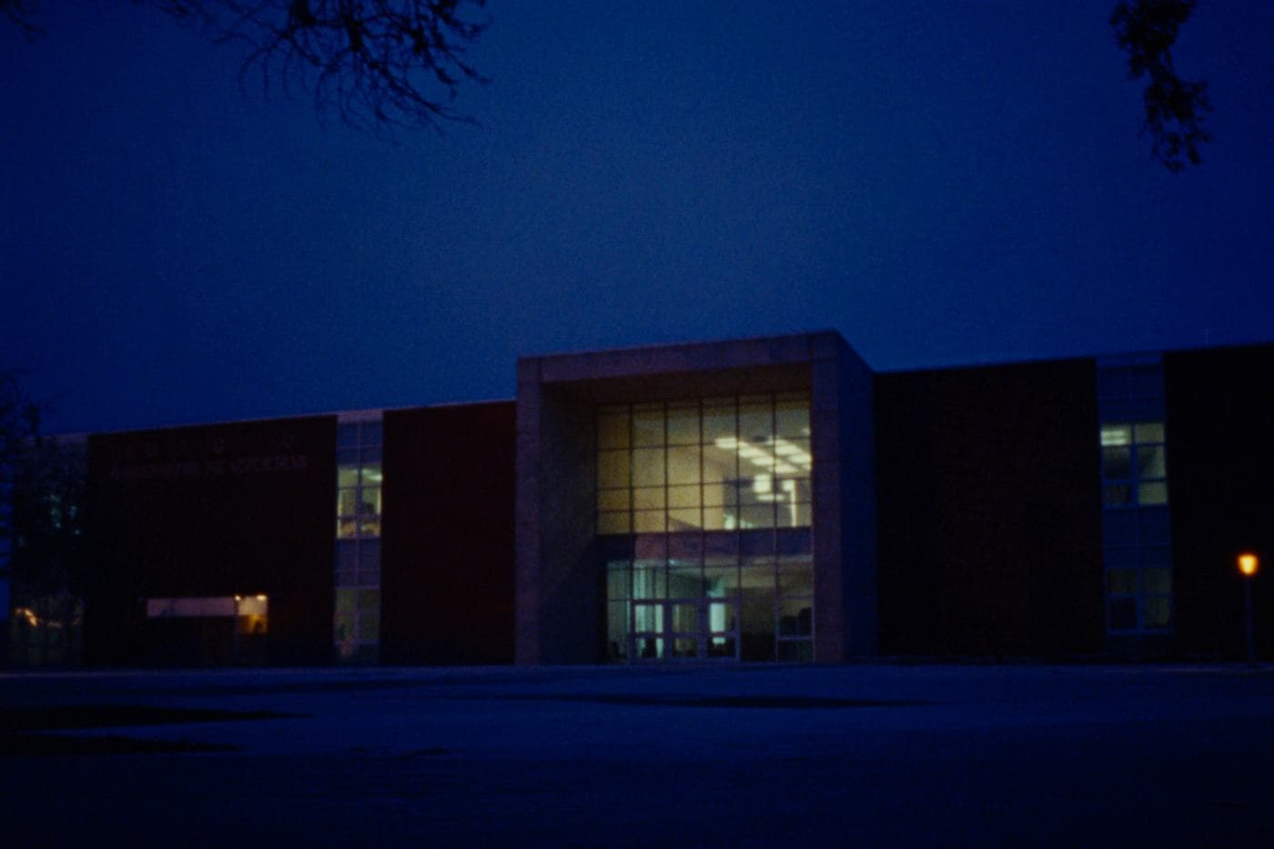 A medical school building at dusk